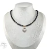 Collar con dije corazón ojo