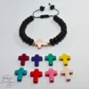Pulsera de piedras negras con cruz