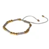 Pulsera tejida con balines de chapa de oro