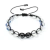 Pulsera tejida con piedras luna y hematitas